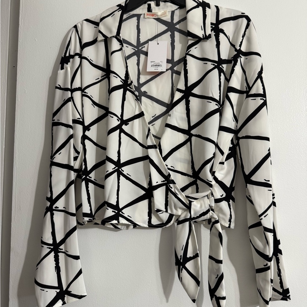NWT: Woman’s Black and White Geometric Blouse